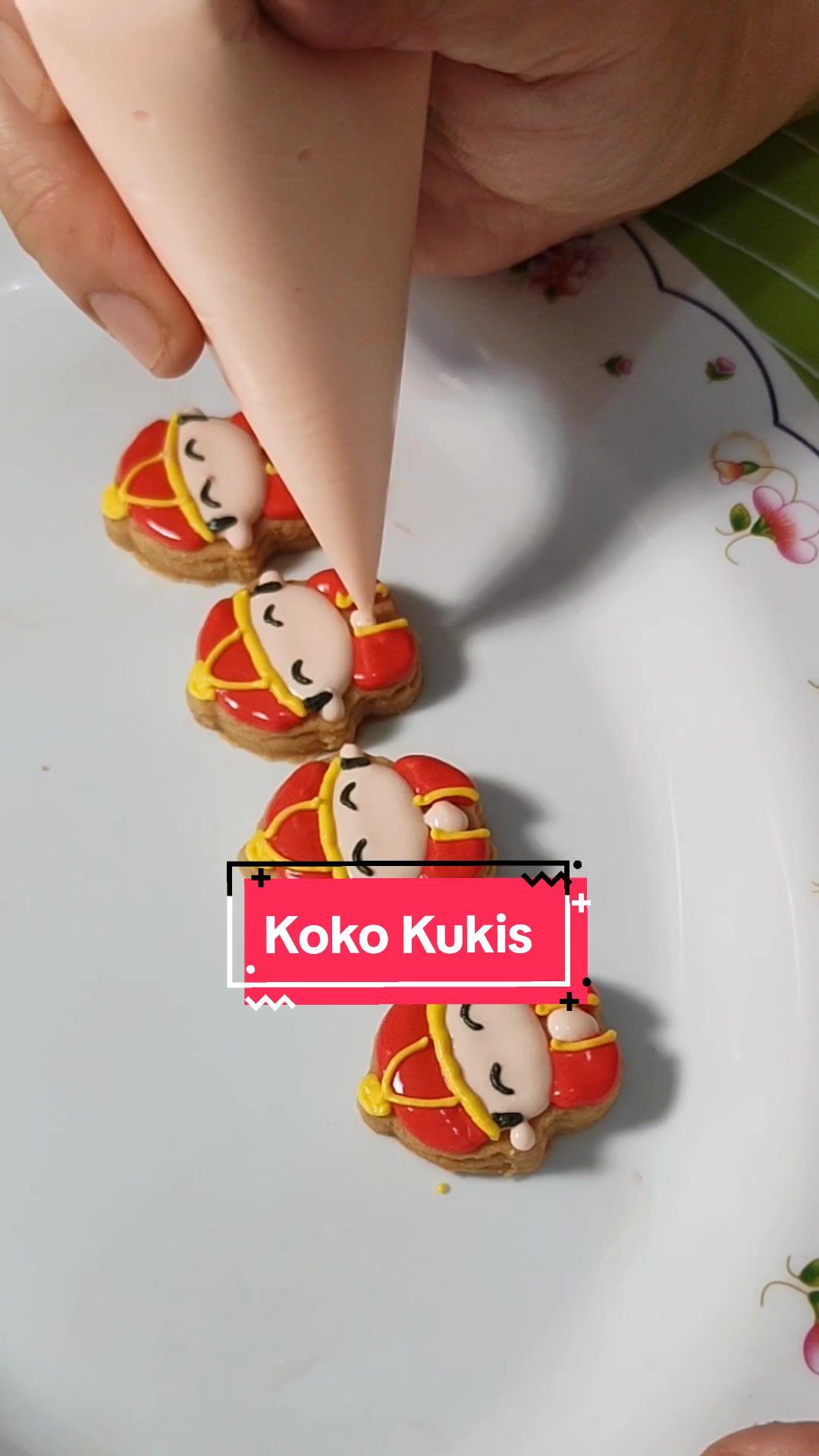 Custom character cookie with pastel royal icing